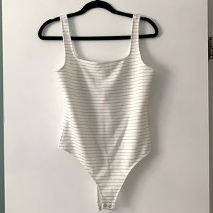 New with tags cream striped bodysuit from Express!